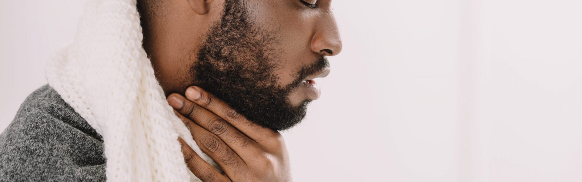 diseased african american man having sore throat diseased african american man having sore throat